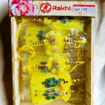 Load image into Gallery viewer, Fancy Vibrant Yellow Bhaiya-Bhabhi  Rakhi Set
