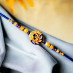 Load image into Gallery viewer, Adorable Om Design Stone Rakhi
