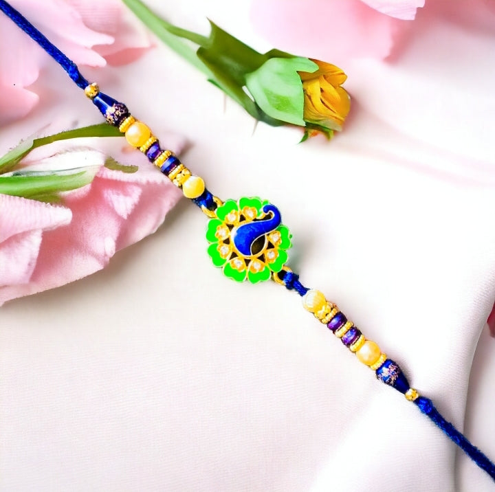 Beautiful Stone Rakhi With Peacock Design In The Center
